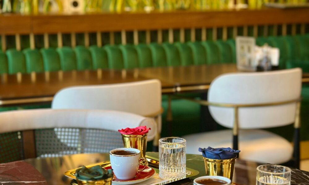 Cinema café interior with warm lights and coffee cups