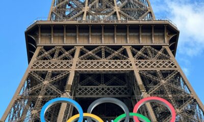 Concept design of Olympic rings in front of LA skyline.