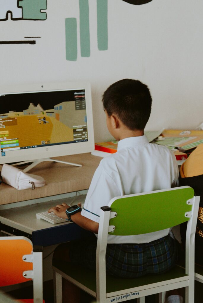 Students enjoying Coolmath Games during free time at school