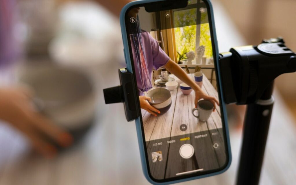Content creator recording short-form marketing video for TikTok and Instagram Reels