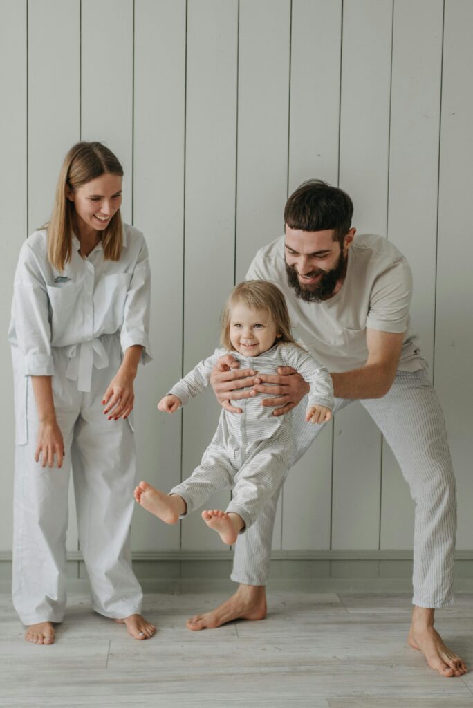 Parents playing with kids, or a family dinner at home.