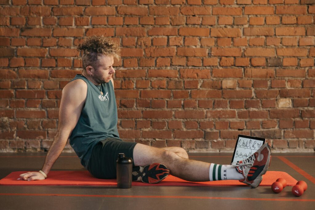 Fitness enthusiast cooling down after a HIIT session.