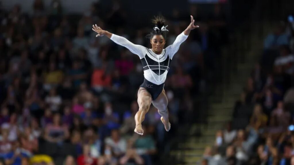 Balance beam routine with perfect form.