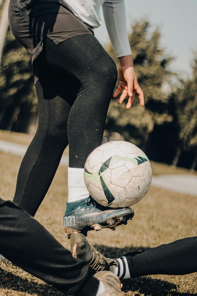 Professional soccer player wearing Adidas cleats