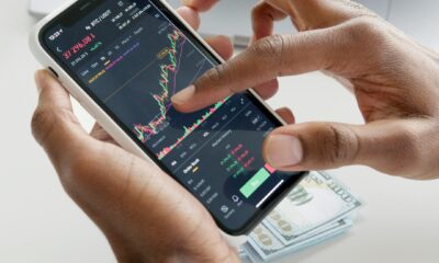 A person using a mobile banking app on their phone.