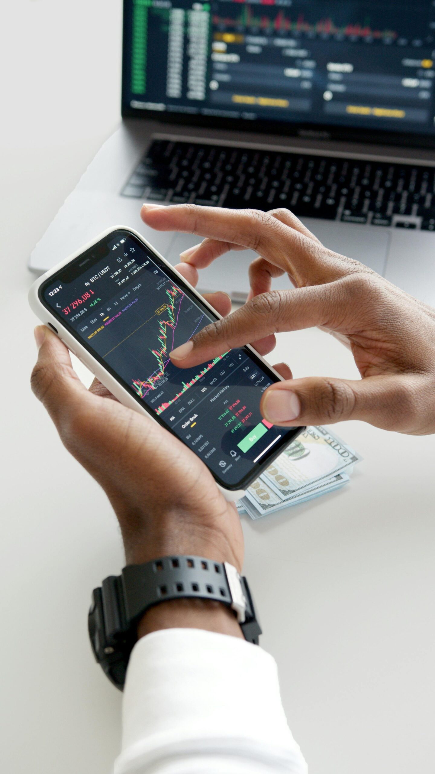 A person using a mobile banking app on their phone.