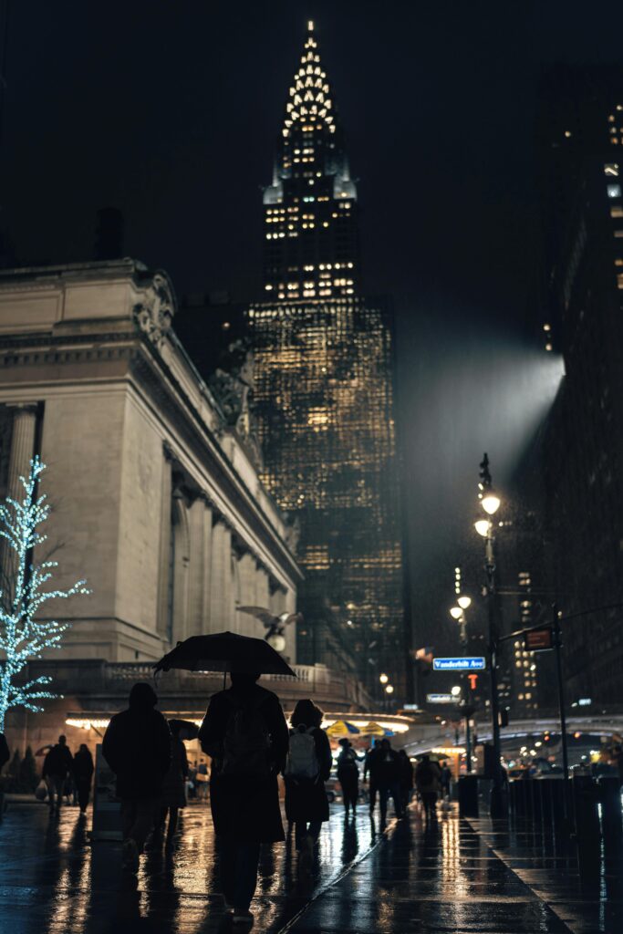 A wide shot of the Chrysler Building with Manhattan skyline.
