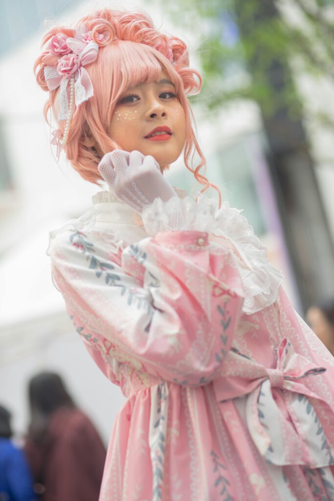 A Sweet Lolita outfit with pastel colors and lace details