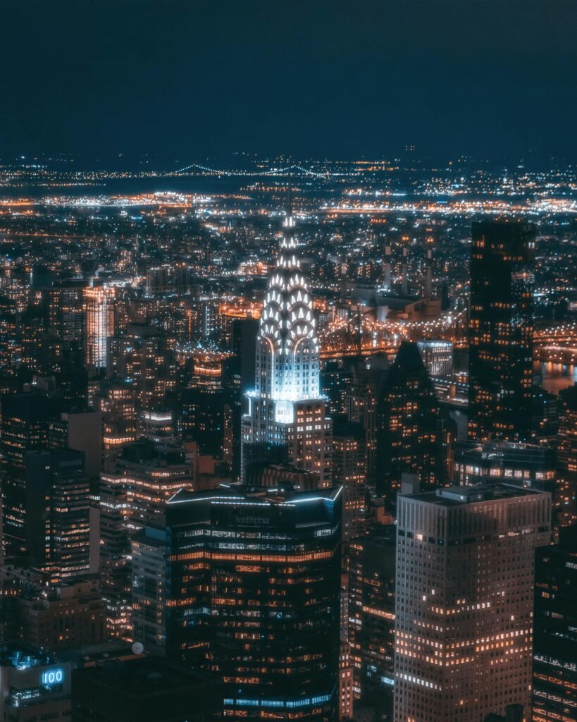 A wide shot of the Chrysler Building with Manhattan skyline.