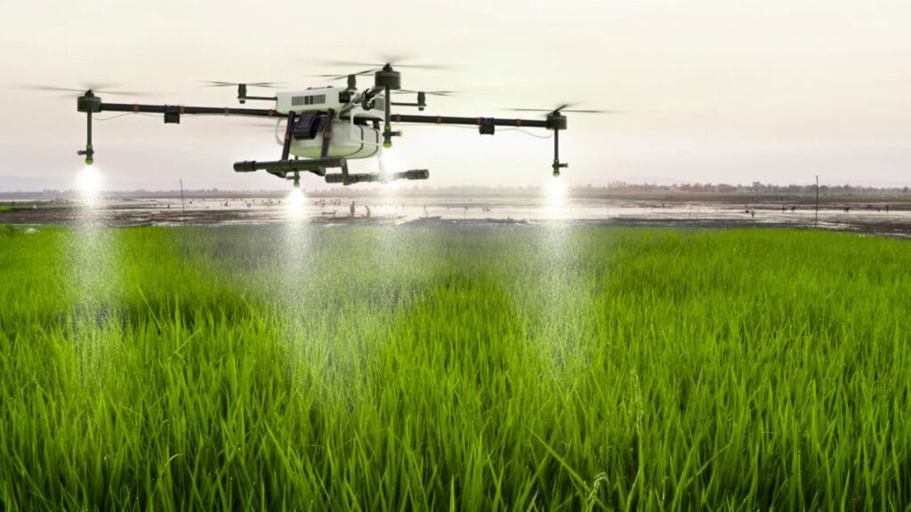 Drones flying over agricultural fields