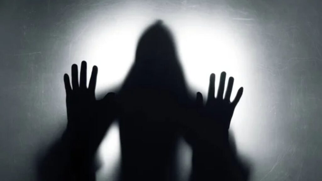 Ghostly figure, mysterious lights, or shadowy hands.