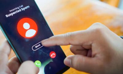 iPhone screen showing spam call blocked notification to stop unwanted calls